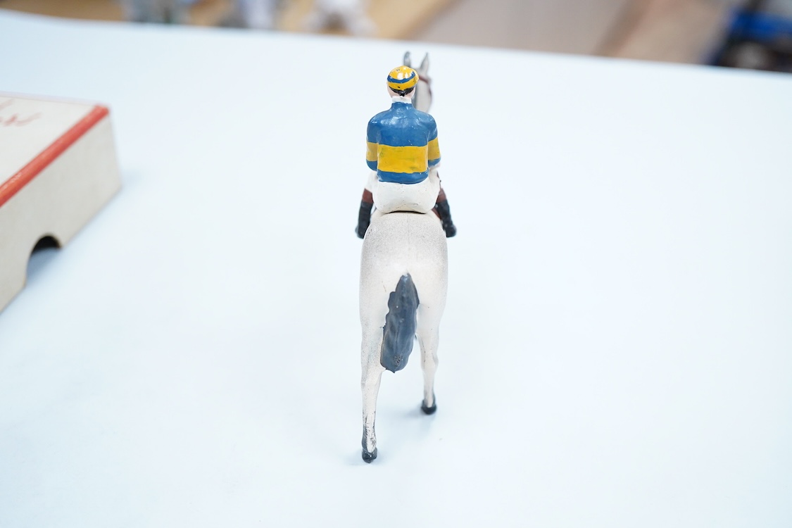 Two boxed Britains Racing Colours of Famous Owners series lead mounted figures; Miss Dorothy Paget - rider in yellow-striped blue jersey on a grey horse, and Msr. M. Boussac - rider in orange jersey on a dark brown horse